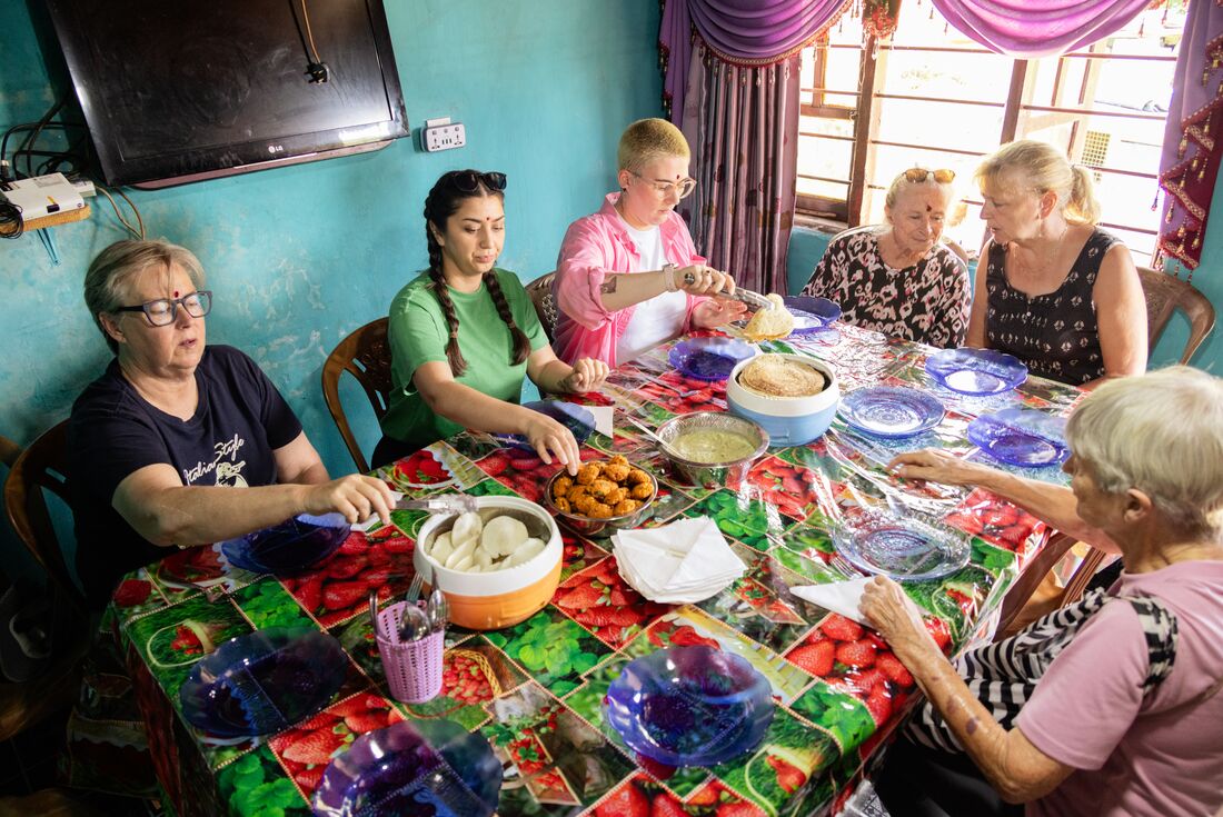 Travellers having Tamil Family Lunch, Bandarawela, Sri Lanka
