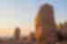 Ancient statue heads of kings and gods lit by the setting sun on the summit of Mount Nemrut in eastern Turkey