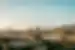 Wide view of the city of Florence during sunset with mountain landscape in the distance, Italy