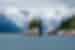 View of island with glacier in the background at Kenai Fjords National Park