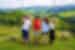 Leader points to elements of hill landscape in Monteverde Costa Rica