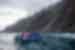 Intrepid group on a zodiac excursion around the mountainous coast of Isla Isabela in the Galapagos