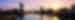 View of River Clyde with arched bridge at sunrise with a pink and blue sky, Glasgow, Scotland