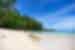 White sands of a beach on Dinawan Island off the northwest coast of Borneo in Malaysia